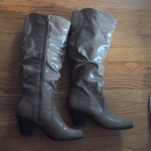 Taupe wide calf boots hit below the knee
